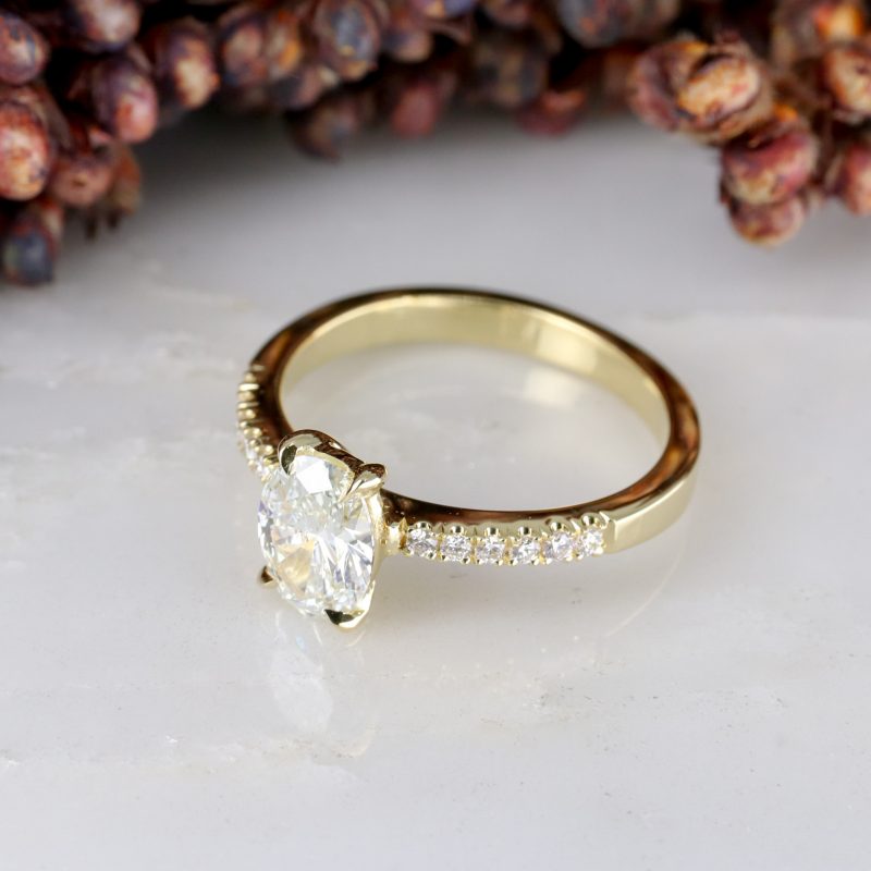 18ct yellow gold oval lab grown diamond rise ring with diamond shoulders