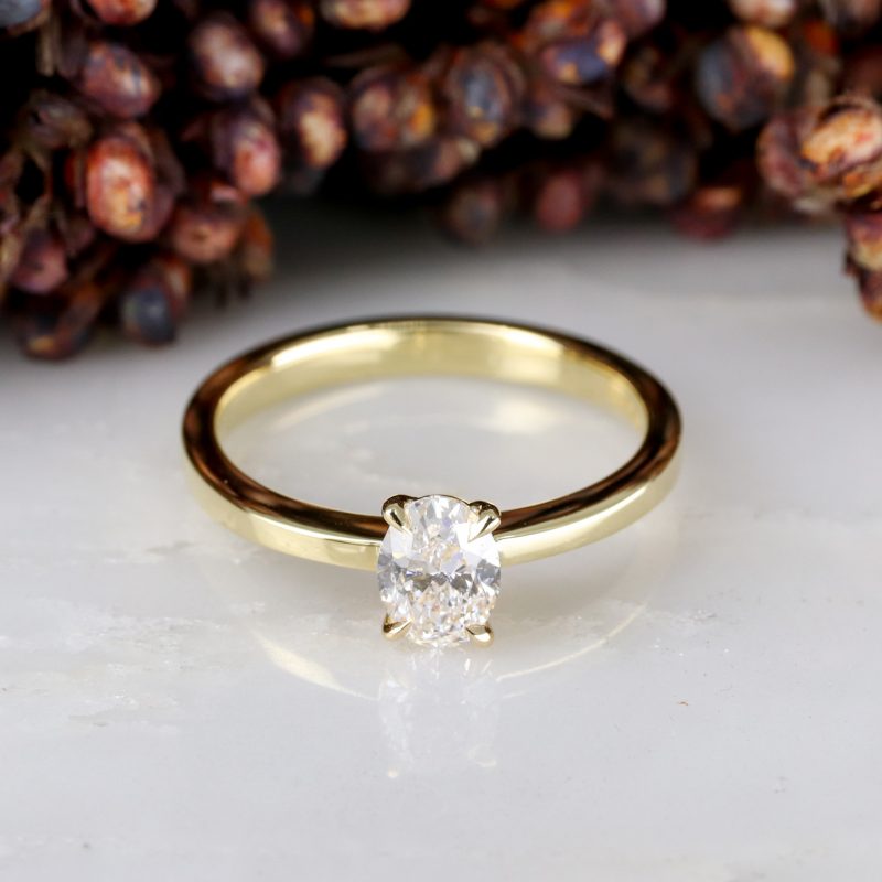 18ct yellow gold 0.53ct oval white diamond rise ring
