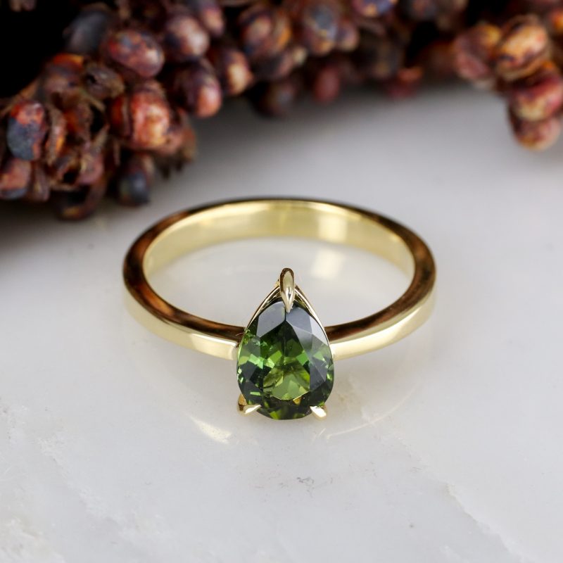 18ct yellow gold pear shape green tourmaline rise ring