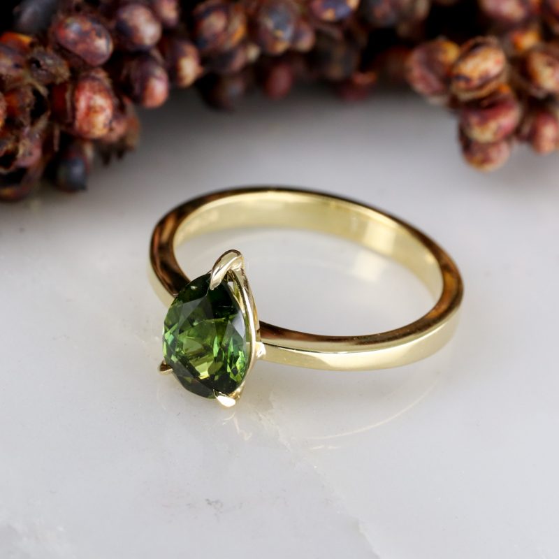 18ct yellow gold pear shape green tourmaline rise ring