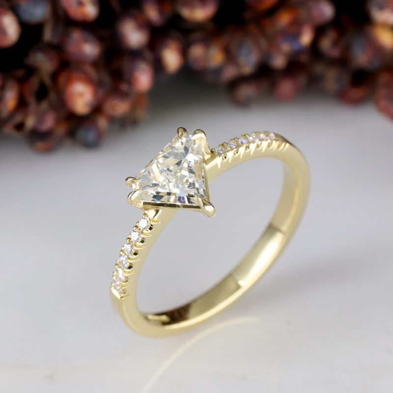 18ct yellow gold shield shape diamond rise ring with diamond shoulders