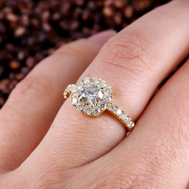 18ct yellow gold cushion cut white diamond ring with diamond halo and shoulder detail