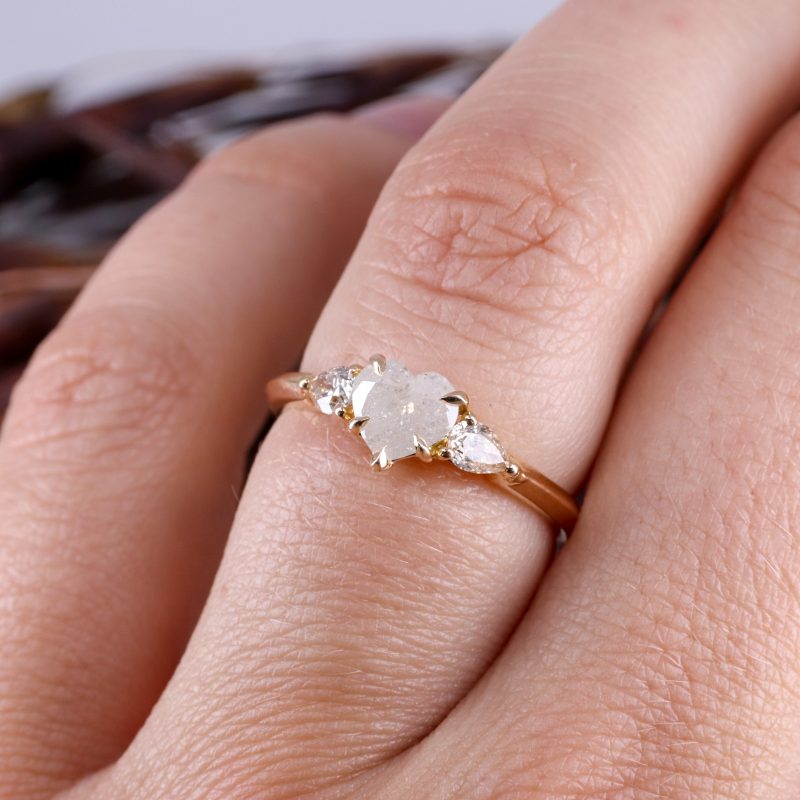18ct rose gold heart shape salt and pepper diamond trilogy ring with white diamond pear shape shoulders