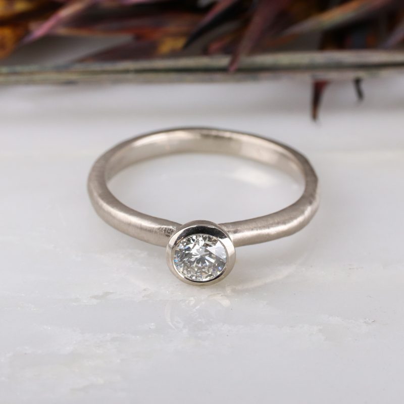 18ct white gold and 0.31ct white diamond molten ring