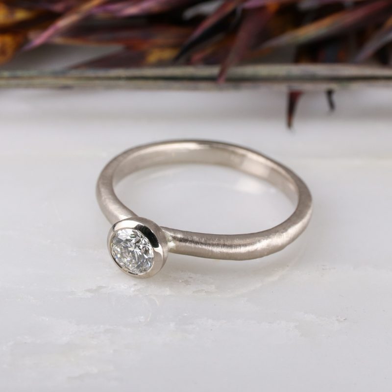 18ct white gold and 0.31ct white diamond molten ring