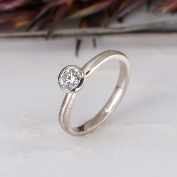 18ct white gold and 0.31ct white diamond molten ring