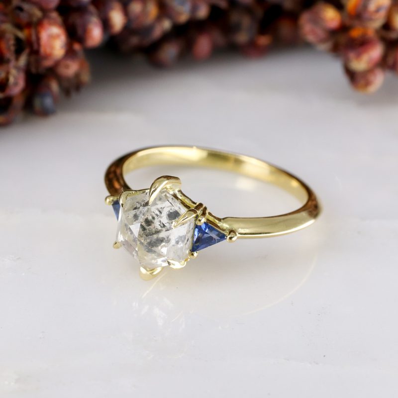 18ct yellow gold hexagon salt and pepper diamond and blue sapphire trilogy ring