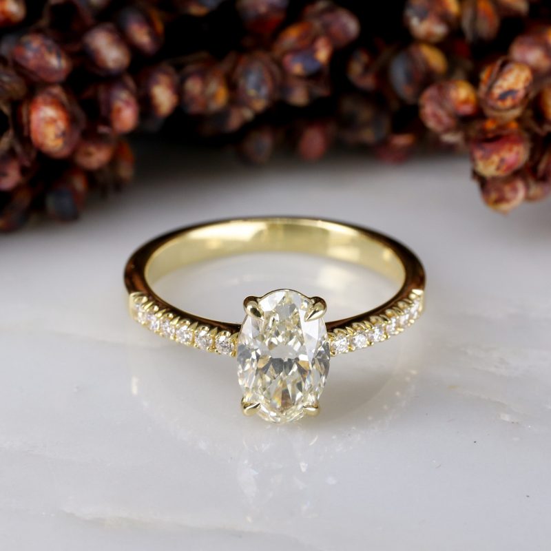 18ct yellow gold 1.30ct oval pale yellow diamond rise ring