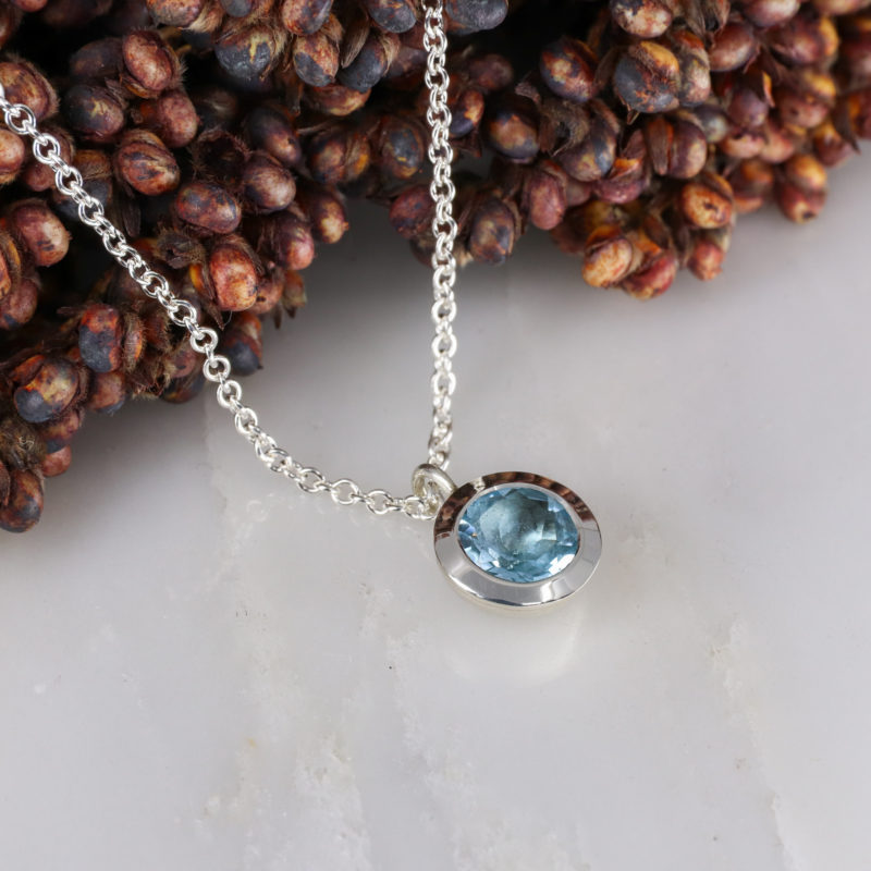 Silver and sky blue topaz pendant