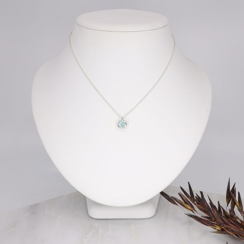 Small silver and sky blue topaz pendant