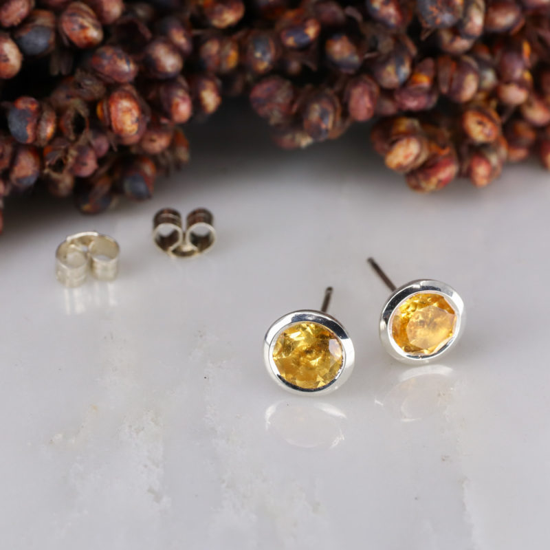 Silver rubover set citrine ear studs