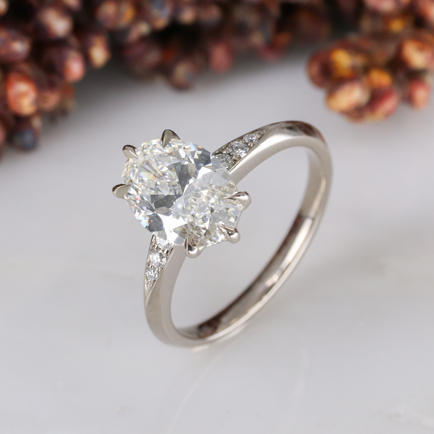 Platinum Coco engagement ring with lab-grown diamond oval centre ...