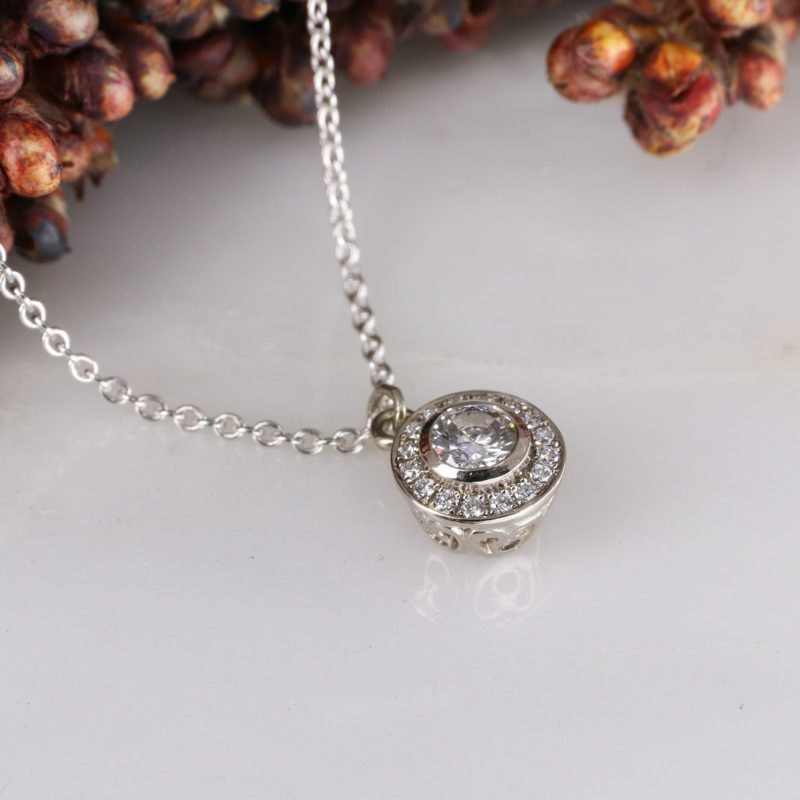 18ct white gold and white diamond molten filigree halo pendant