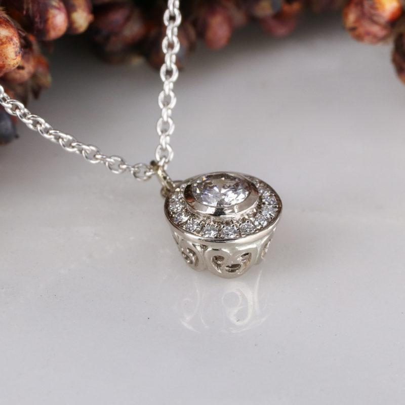 18ct white gold and white diamond molten filigree halo pendant