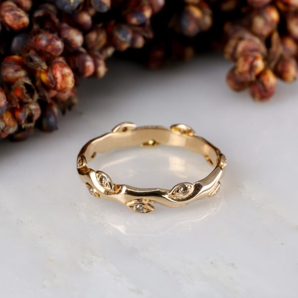 18ct rose gold and champagne diamond rose and thorn wedding band
