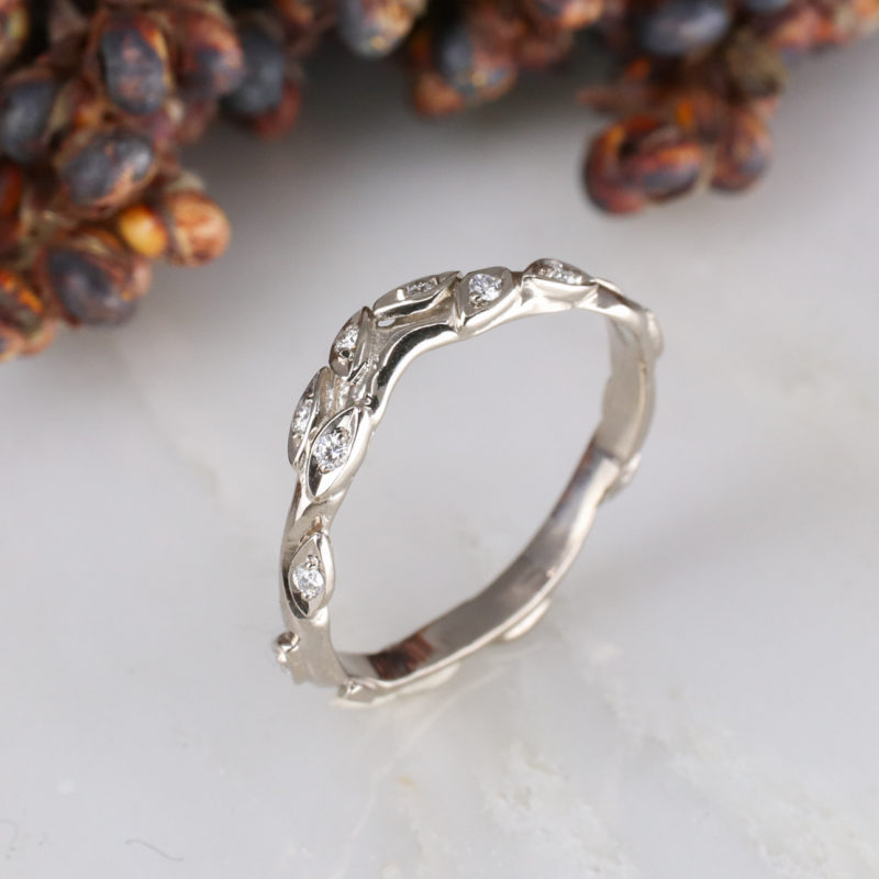 18ct white gold and white diamond curved rose and thorn wedding band
