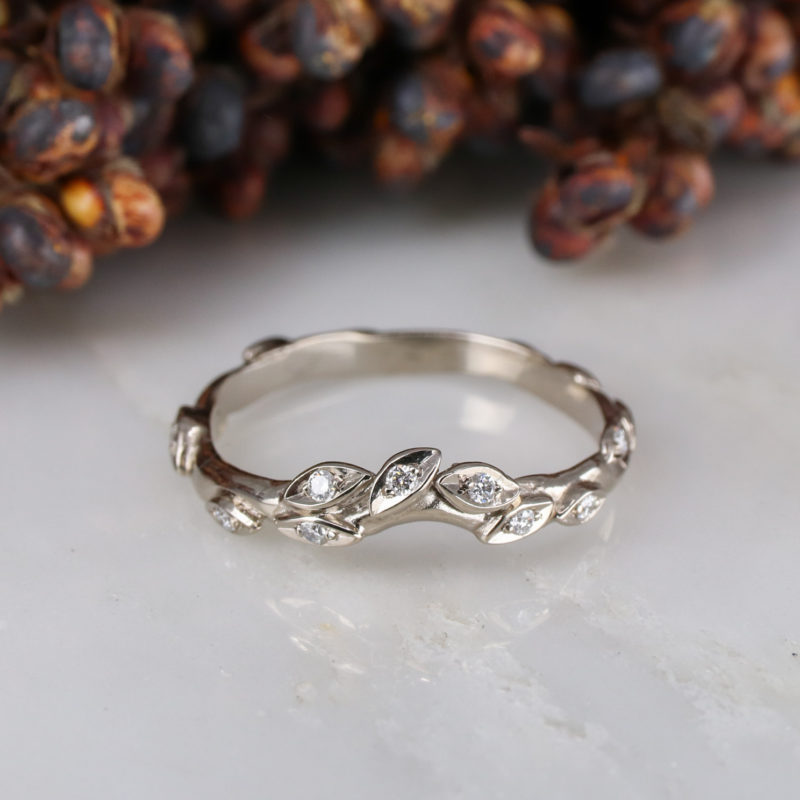 18ct white gold and white diamond curved rose and thorn wedding band