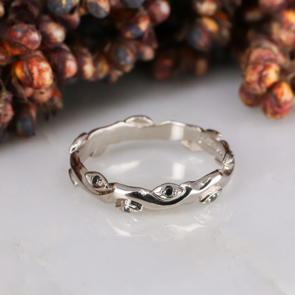 18ct white gold and black diamond rose and thorn wedding band