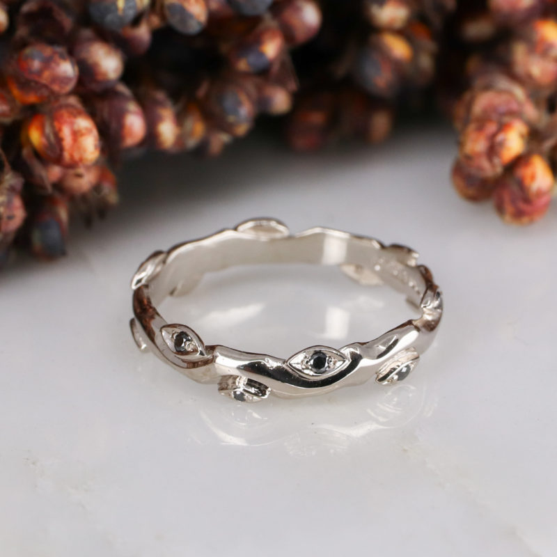 18ct white gold and black diamond rose and thorn wedding band