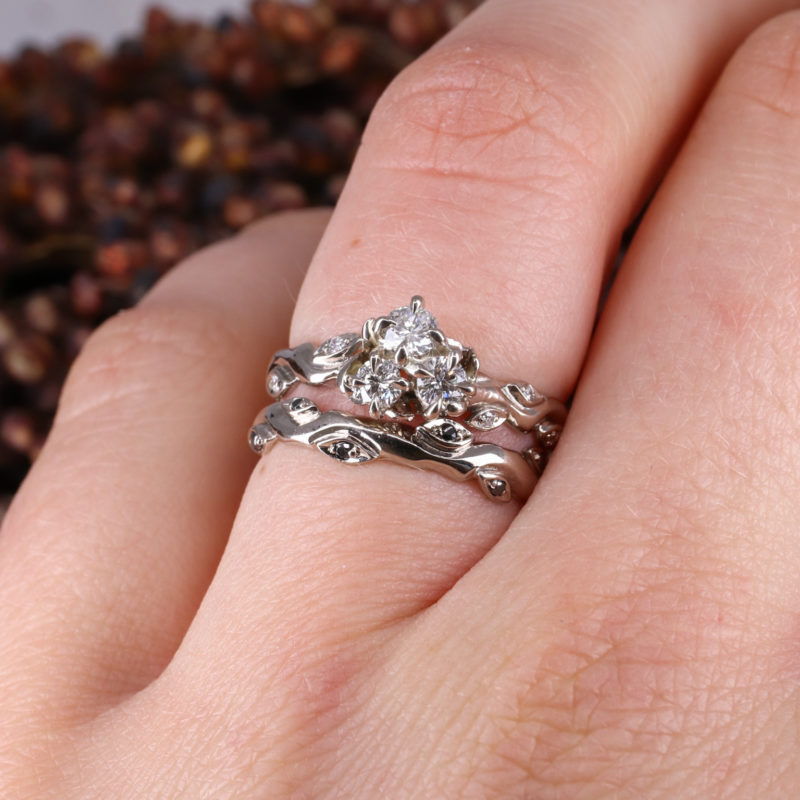 18ct white gold and black diamond rose and thorn wedding band