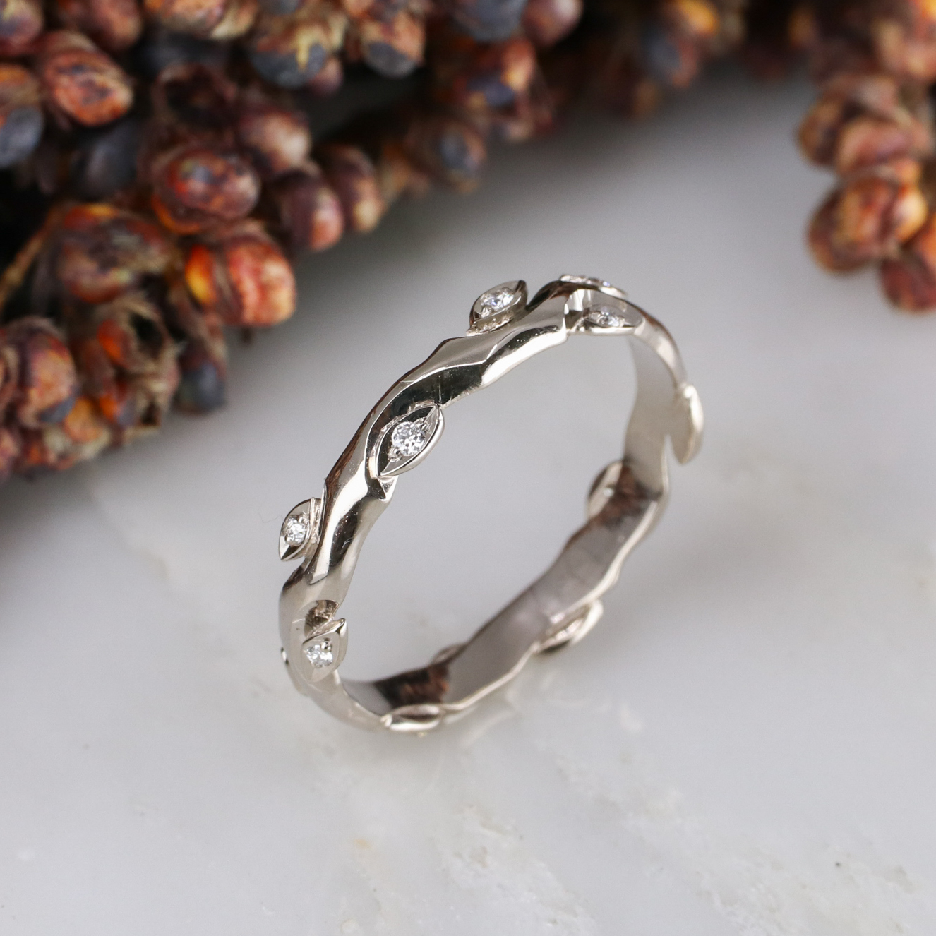 18ct white gold and white diamond rose and thorn wedding band