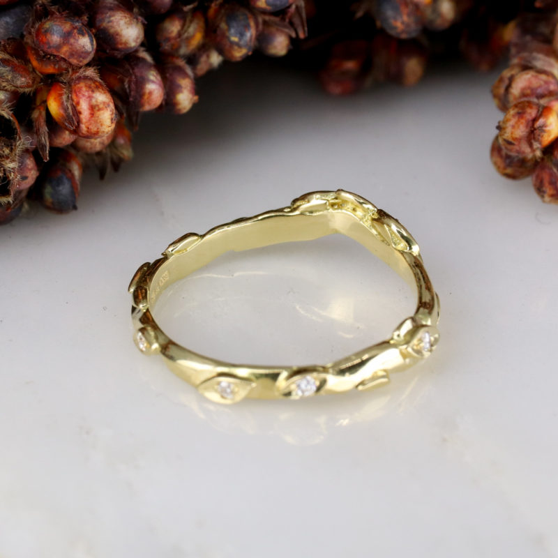 18ct yellow gold and white diamond curved rose and thorn wedding band