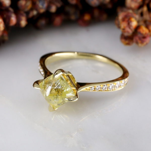 18ct yellow gold rough yellow diamond solitaire ring with pave diamond shoulders
