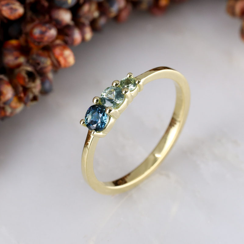 18ct yellow gold triple green sapphire ring
