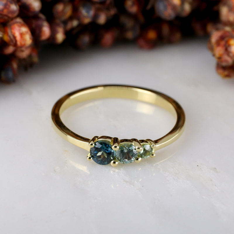 18ct yellow gold triple green sapphire ring