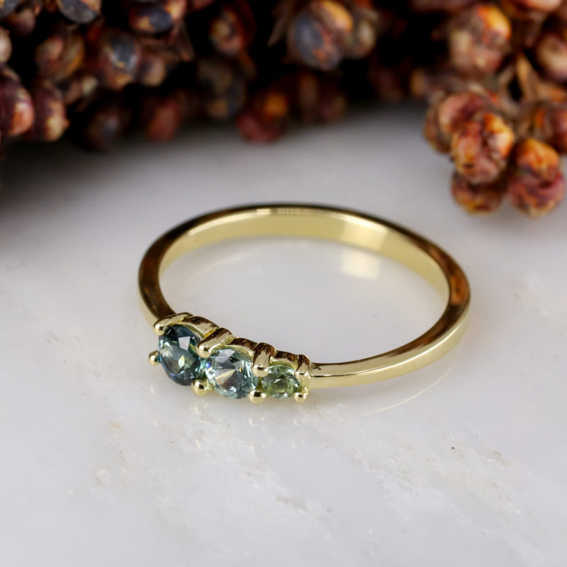 18ct yellow gold triple green sapphire ring