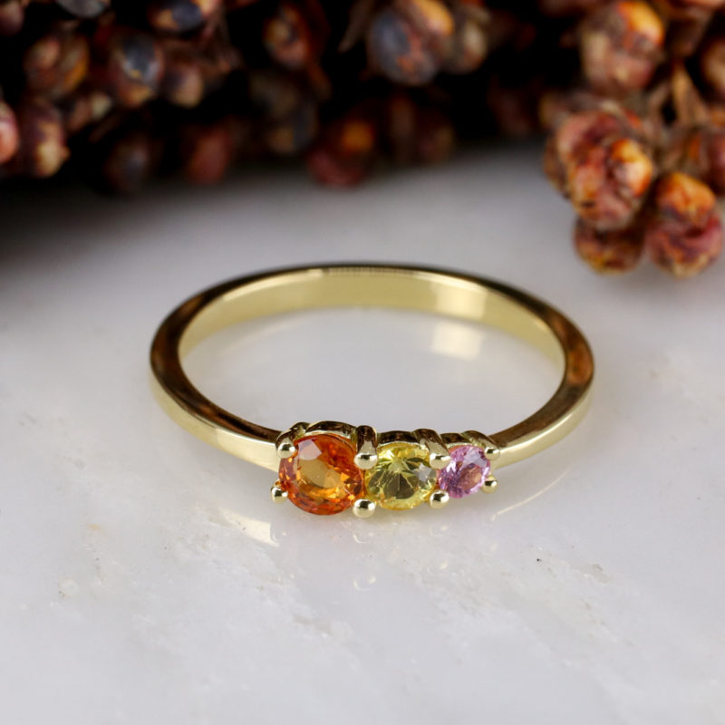 18ct yellow gold triple sunset sapphire ring