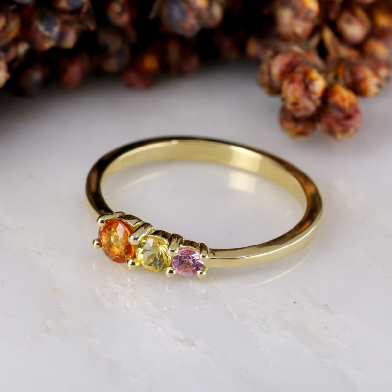 18ct yellow gold triple sunset sapphire ring