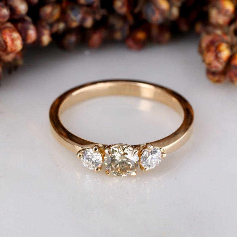 18ct rose gold trilogy ring with champagne and white diamonds