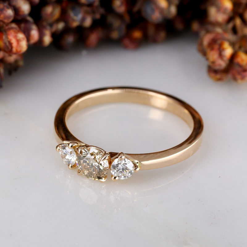 18ct rose gold trilogy ring with champagne and white diamonds