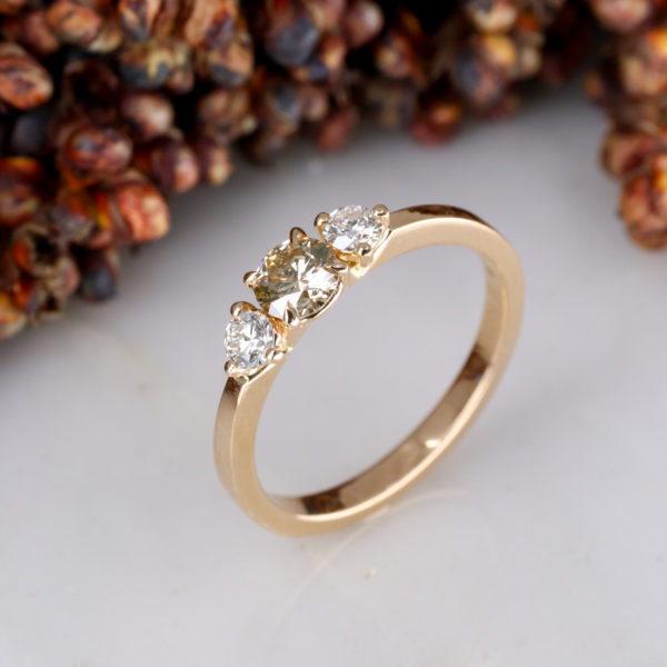 18ct rose gold trilogy ring with champagne and white diamonds