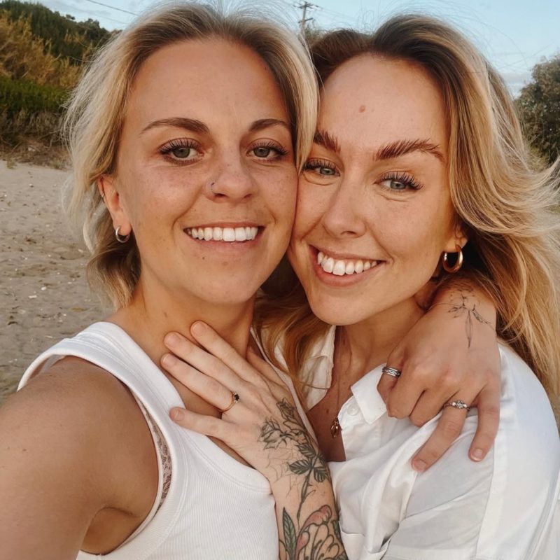 couple hugging on the beach
