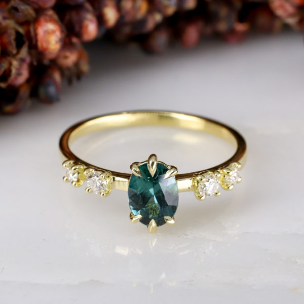 18ct yellow gold oval teal sapphire and diamond engagement ring