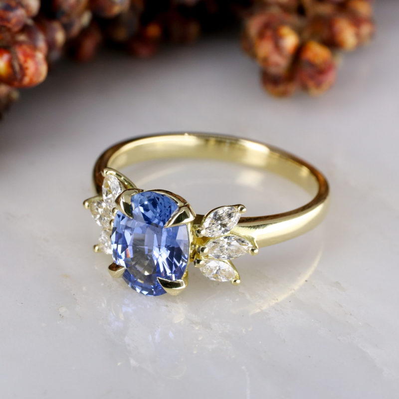 Blue sapphire Winged engagement ring in 18ct yellow gold