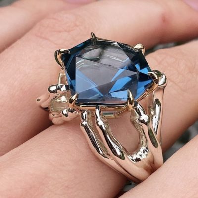 Claw Ring wit blue stone
