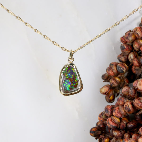 Australian forest opal freeform shape in 9ct yellow gold