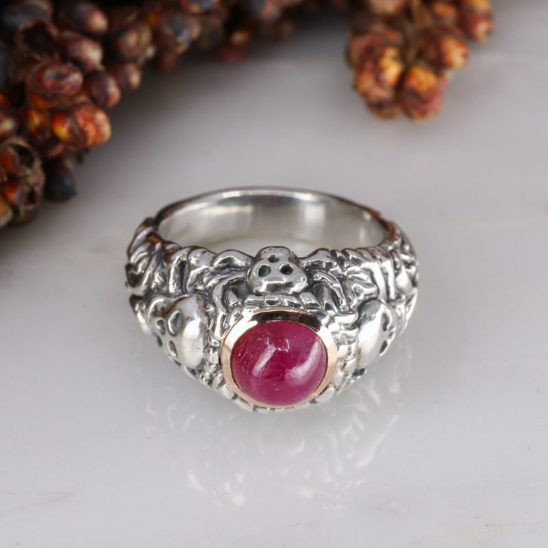 Silver pirate ring with 9ct rose gold rubover set ruby