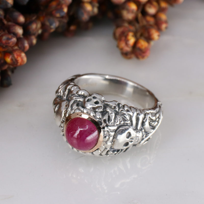 Silver pirate ring with 9ct rose gold rubover set ruby