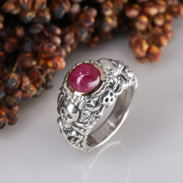 Silver pirate ring with 9ct rose gold rubover set ruby