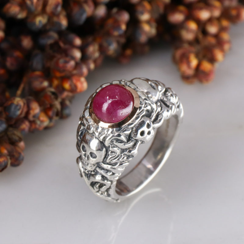 Silver pirate ring with 9ct rose gold rubover set ruby