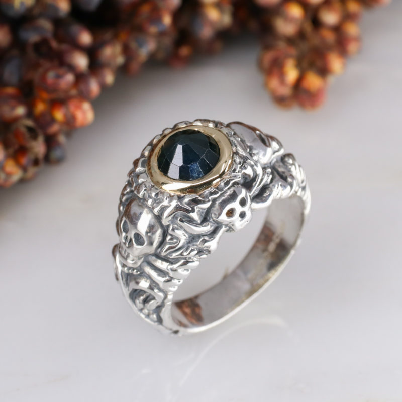 Silver pirate ring with 9ct yellow gold rubover set sapphire