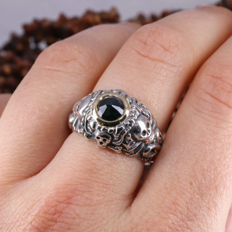 Silver pirate ring with 9ct yellow gold rubover set sapphire