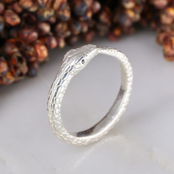Ouroboros snake ring in silver with black diamond eyes