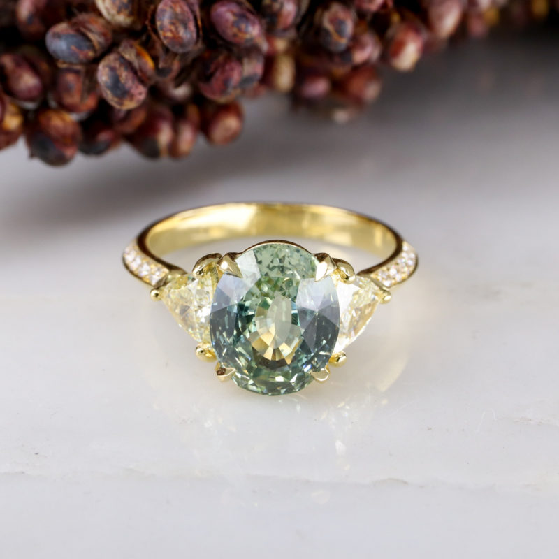 18ct yellow gold sage green sapphire and pale yellow diamond trilogy