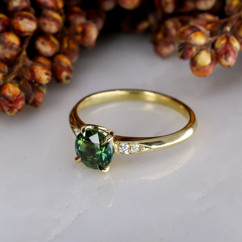 18ct yellow gold green sapphire coco ring with diamond shoulders