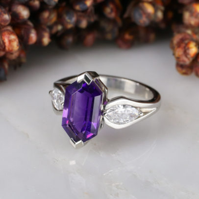 Elongated hexagon amethyst centre and marquise diamond sides